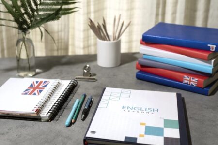 english-books-stacks-table-working-space-scaled_